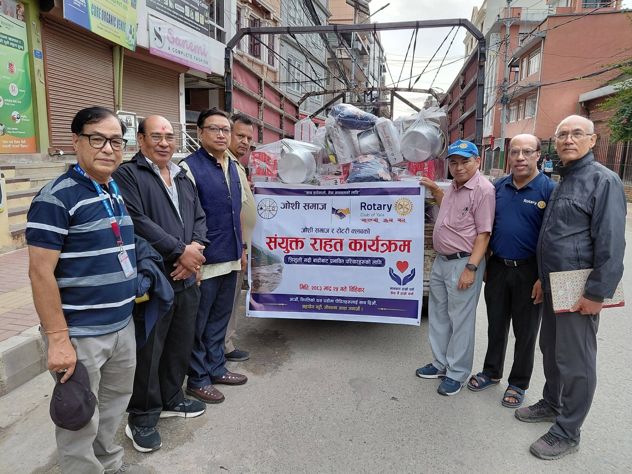 Supporting Flood victims with Untensils together with Joshi Samaj