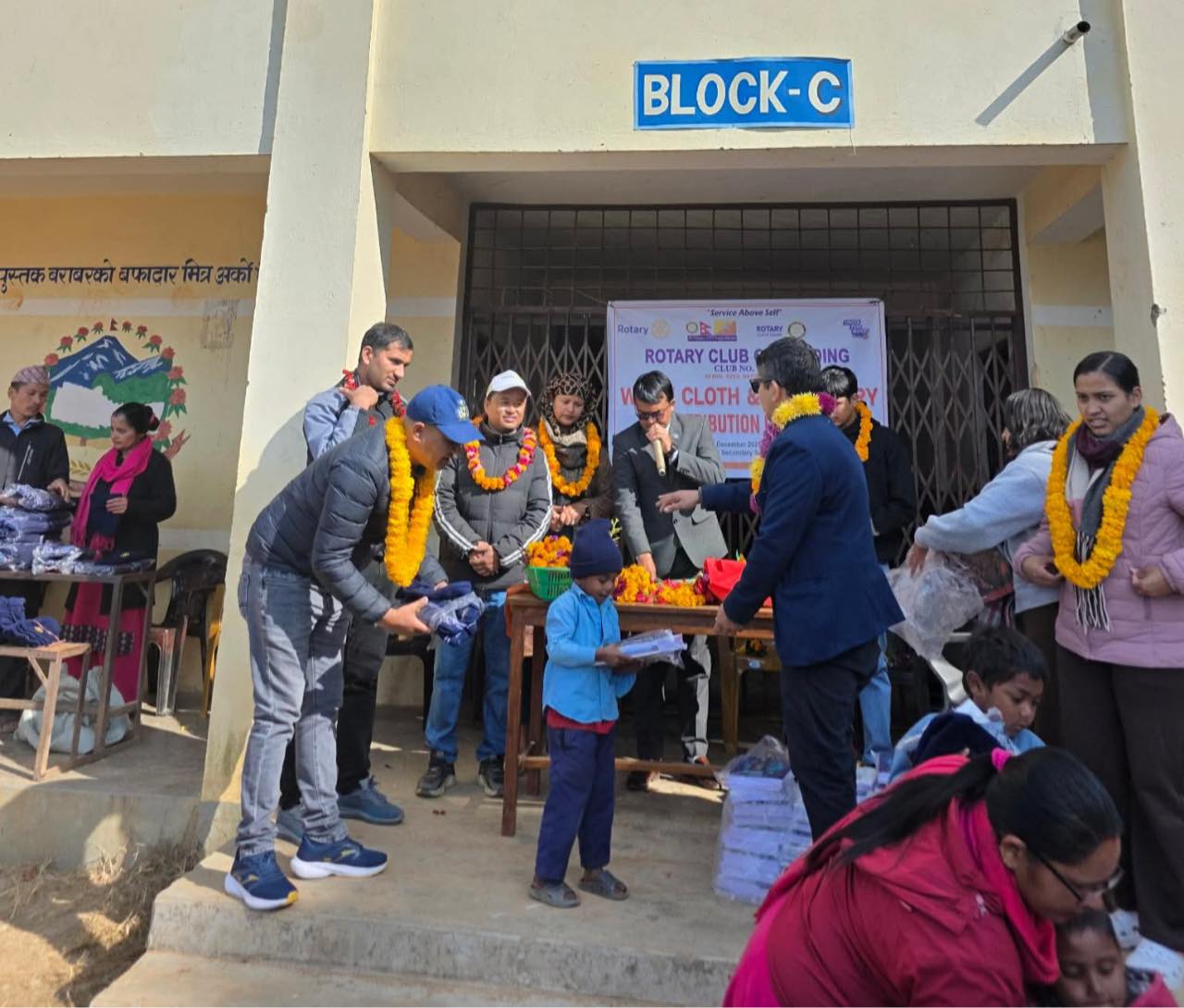 Warm clothes and Stationery distribution